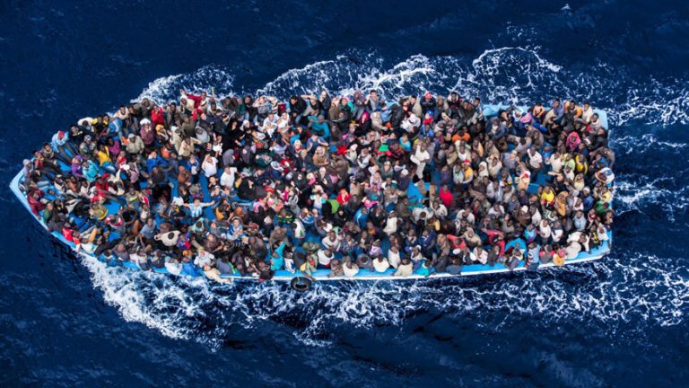 Migrants refugees boat